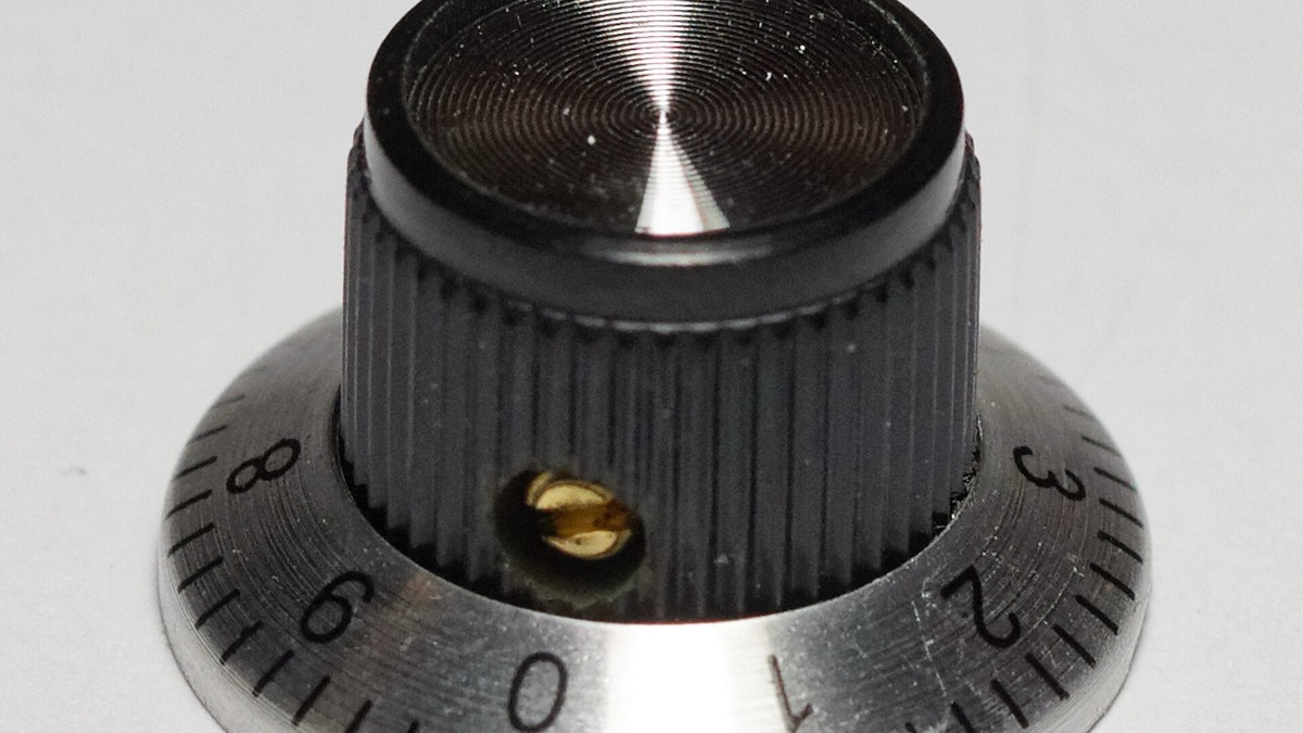 A black knob on a silver 0–8 scale dial, pointer resting near the low end — a metaphor for setting the right effort level (photo by Retired electrician, CC0, Wikimedia Commons)