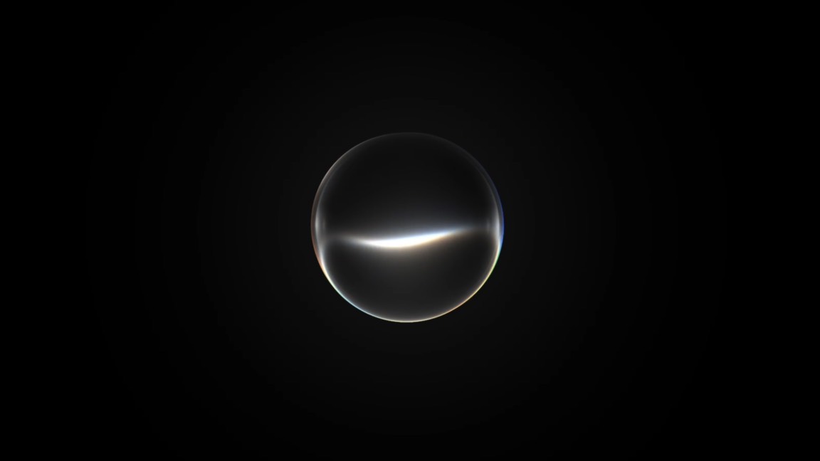 A translucent glowing sphere with a white arc of light along its lower edge, centered on a black background — the signature Siri AI visual