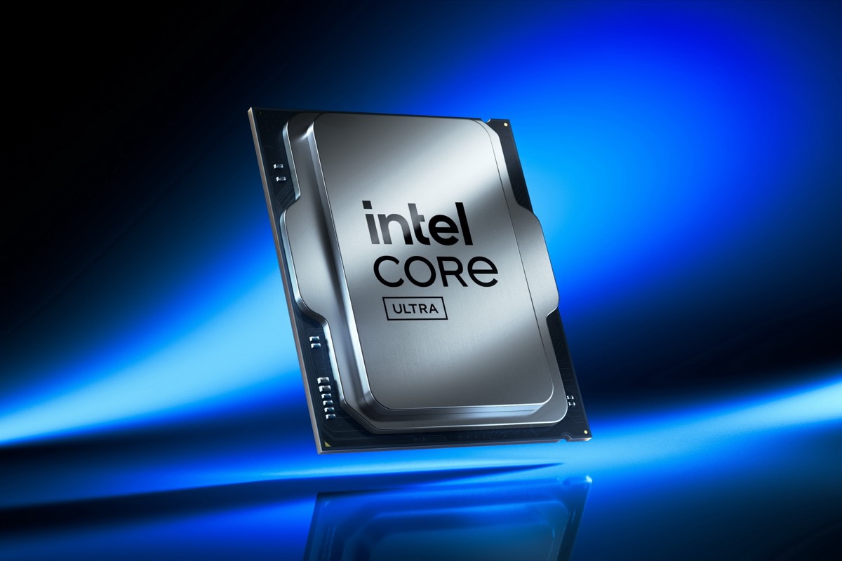 Close-up of a square processor bearing the intel CORE Ultra branding against blue streaked light