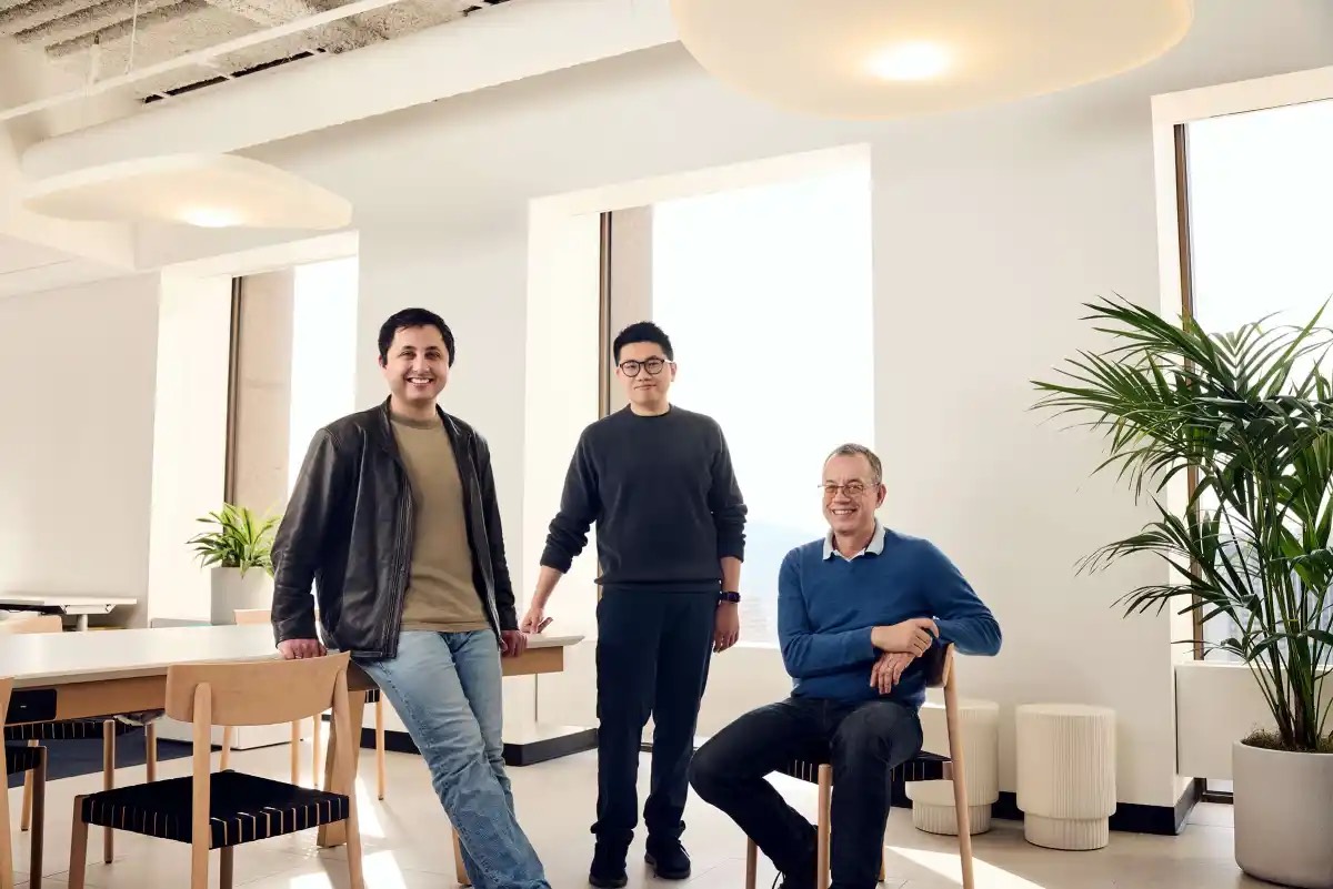 The three Arena founders photographed in a bright office