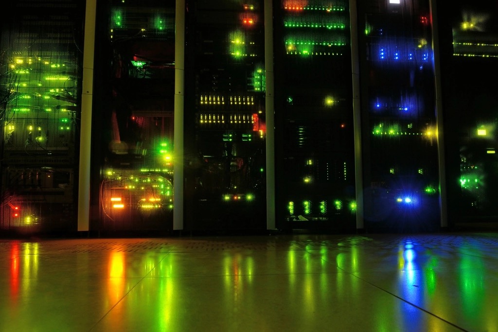 Server racks glowing with colorful status lights