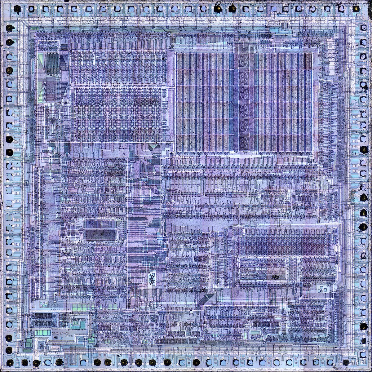 Top metal layer of a microprocessor die, with bond pads around the edge